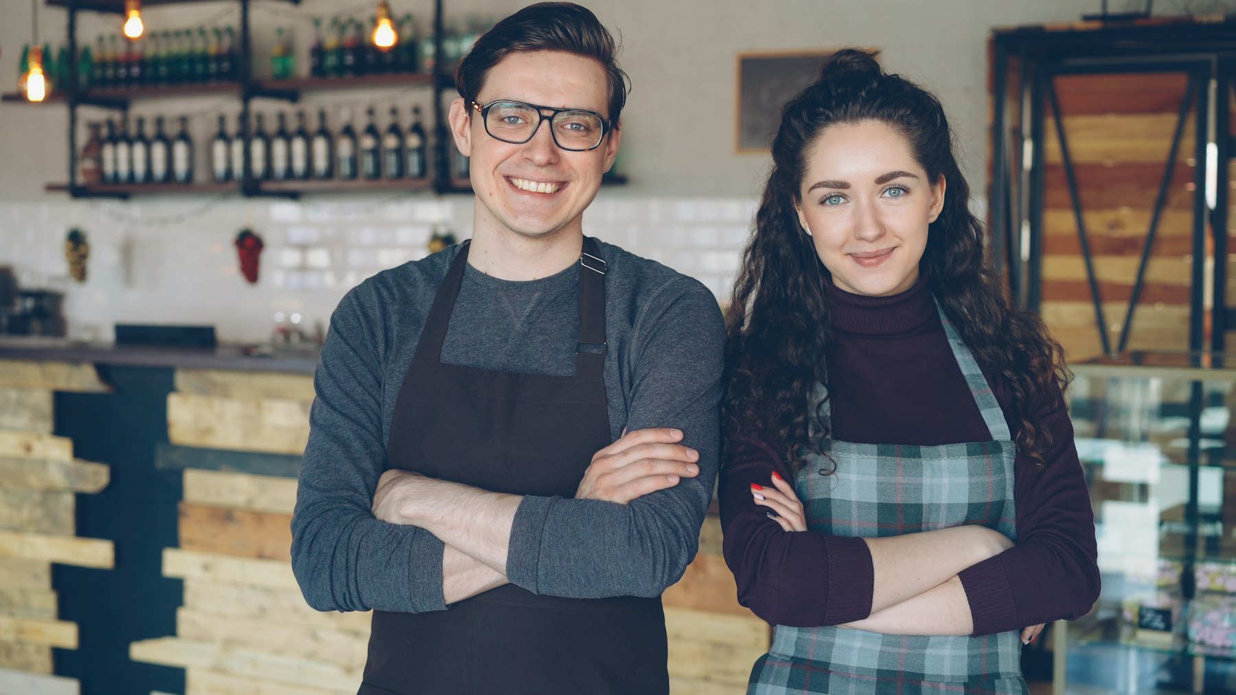 Owners of a small business in their shop in Portugal