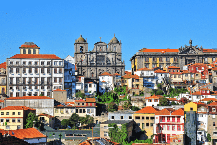 Should i buy a house in Lisbon or in Porto