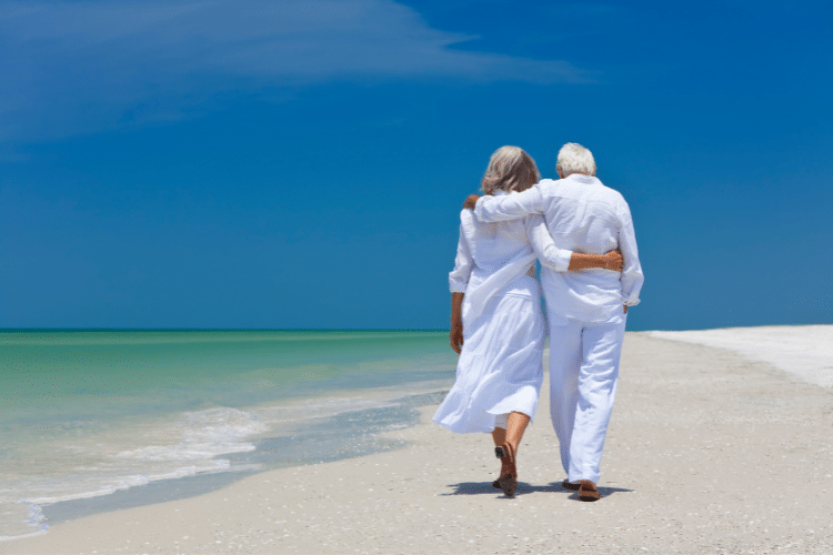 couple-enjoying-the-beach-after-retirement